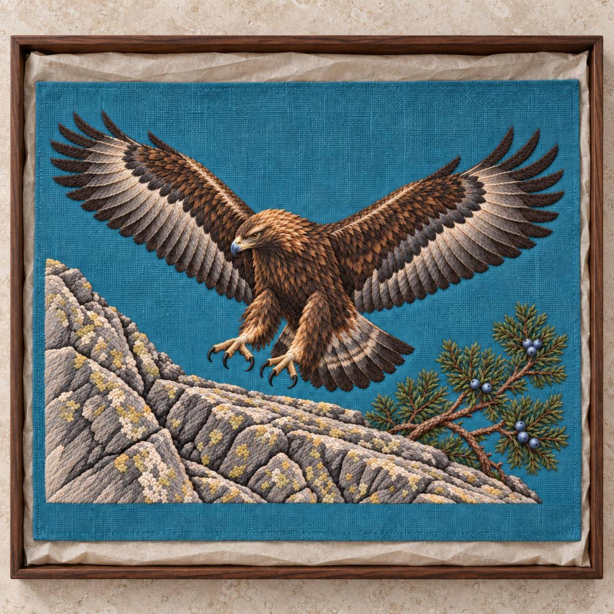 Golden Eagle Above the Juniper Shelf visual mockup shown as a textile panel in a collection tray, with the design on teal-blue linen.