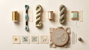 Metallic, variegated, rayon, silk, wool and glow embroidery threads arranged with hand-stitched samples