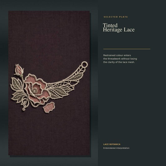 Tinted heritage floral lace applique study on dark textile