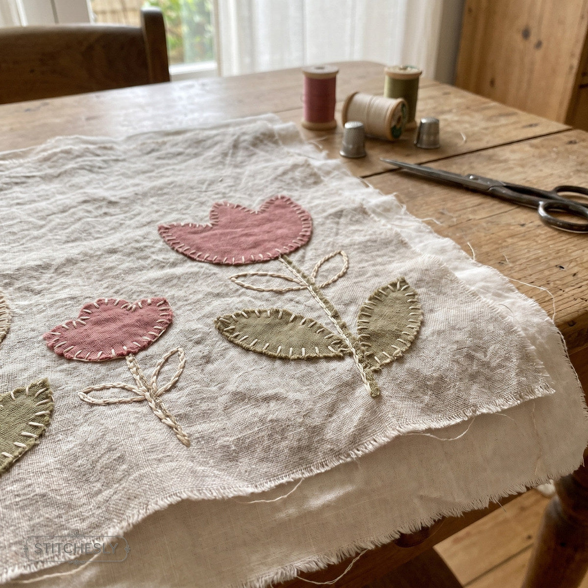 Appliqué Compatible Designs machine embroidery collection cover with stitched design examples