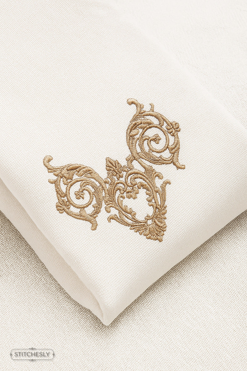 Detail view of Gold Ornamental Cushion machine embroidery design