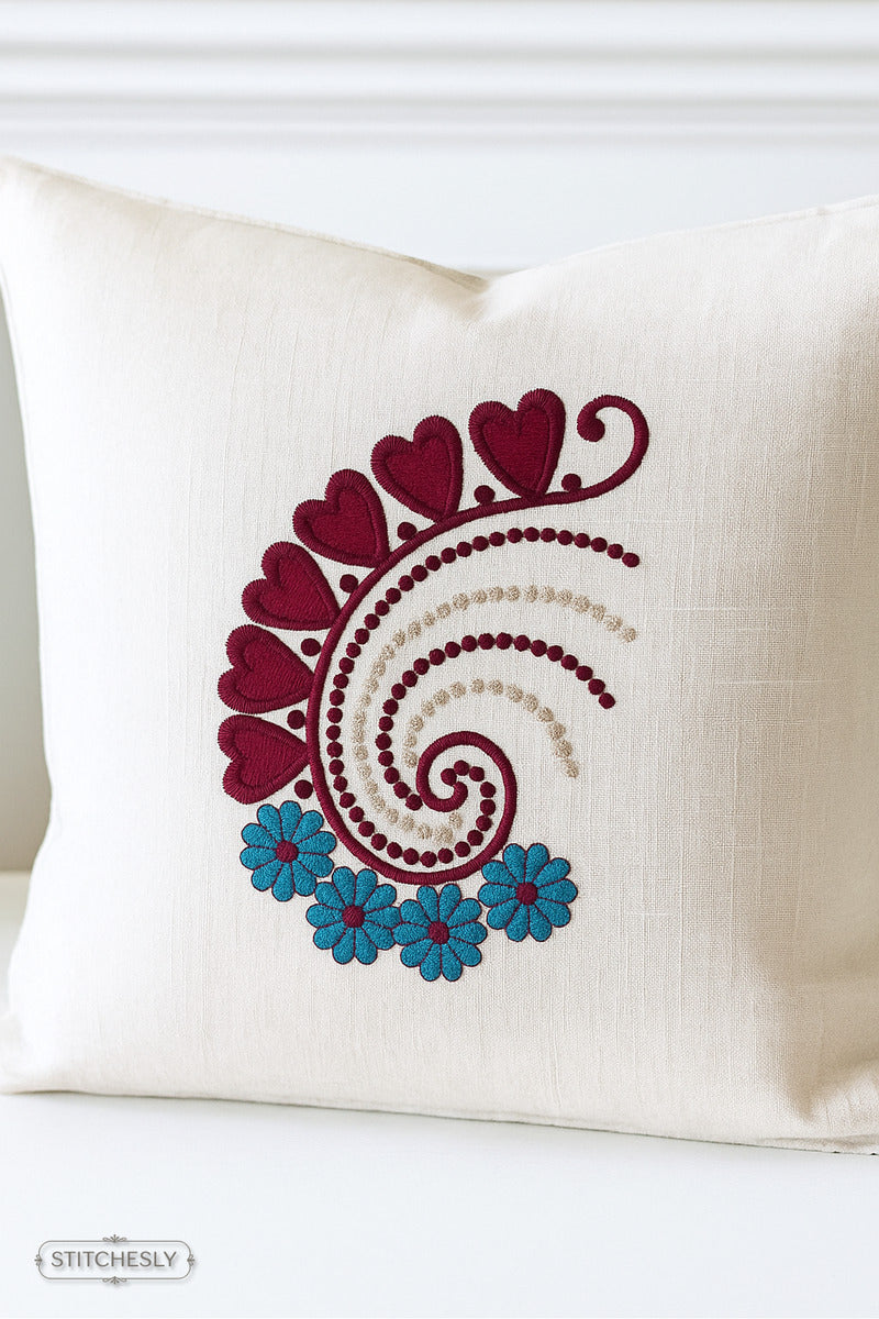Detail view of Folk Paisley Cushion machine embroidery design