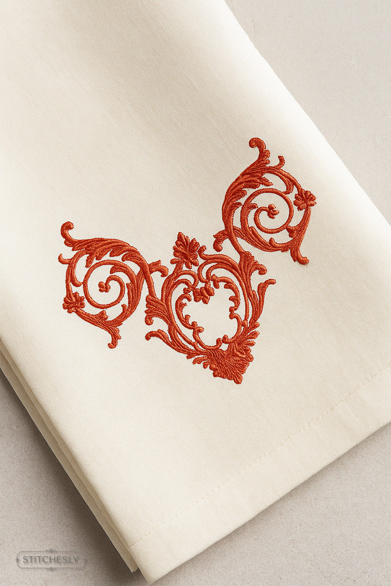 Detail view of Gold Ornamental Cushion machine embroidery design