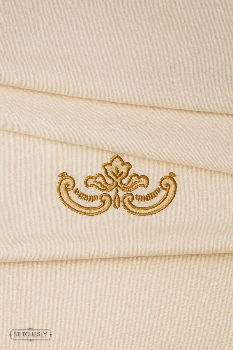 Detail view of Mini Gold Drop Ornament machine embroidery design