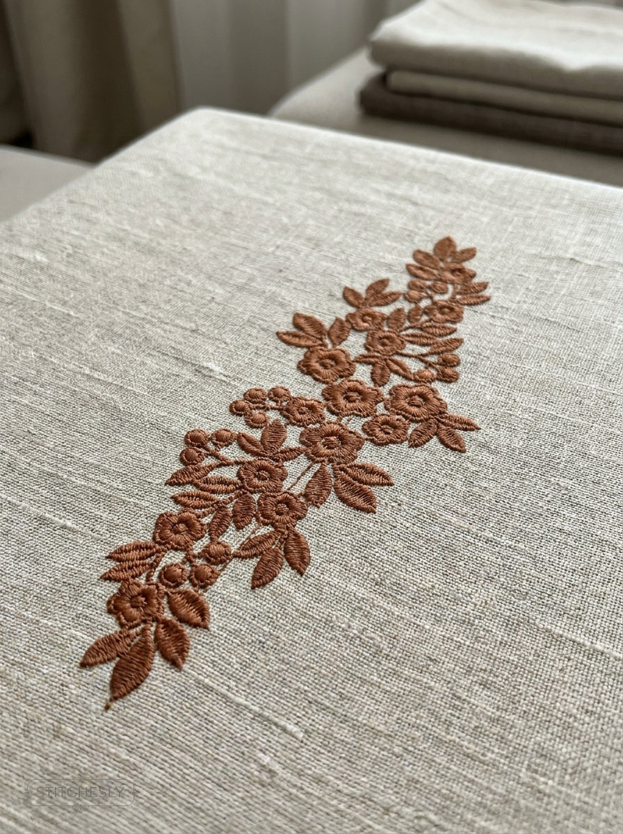 Five Floral Borders Bundle stitched on a finished textile project