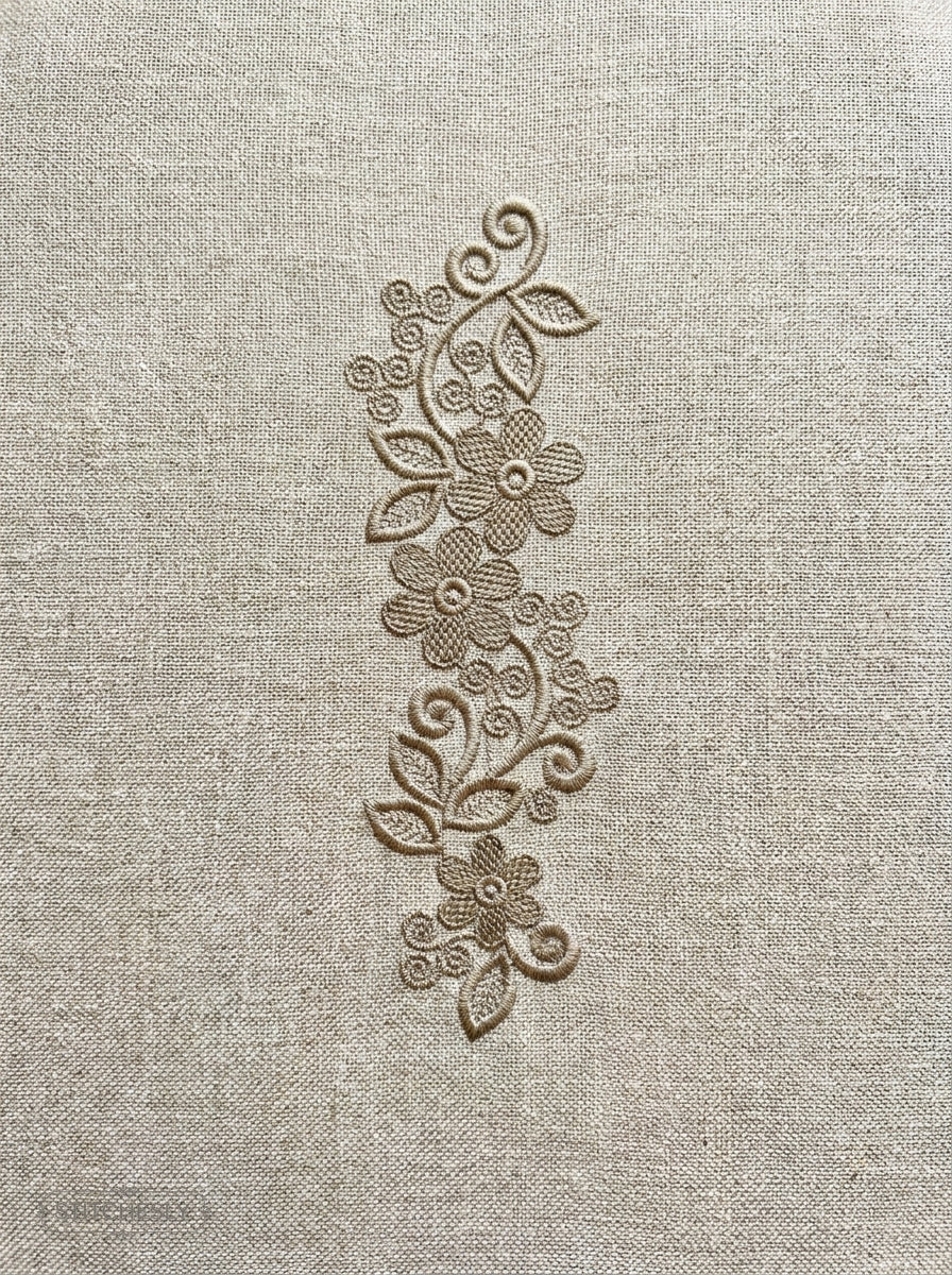 Five Floral Borders Bundle stitched on a finished textile project