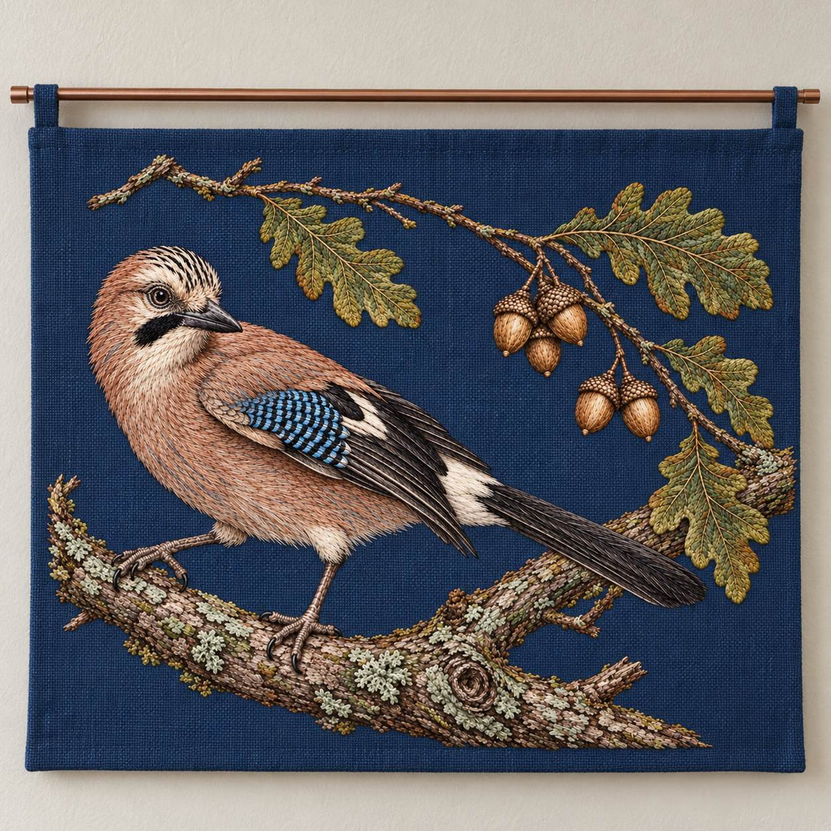Jay Beneath the Fallen Acorn Arc visual mockup shown as a hanging textile held by wooden rails, with the design on deep ink-blue linen.