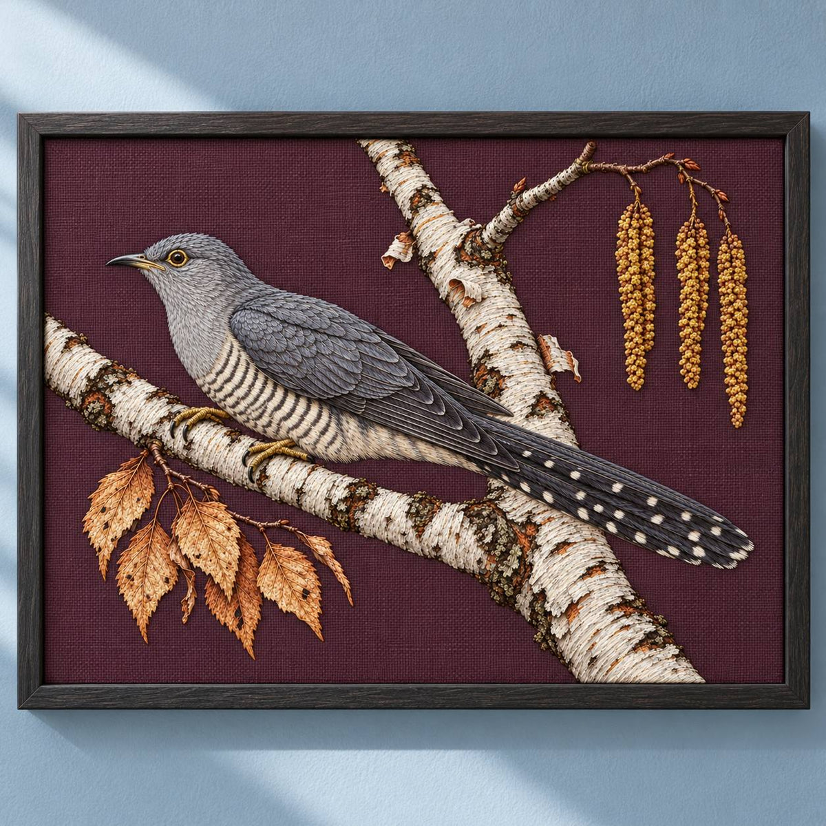 Cuckoo Beyond the Birch Fork visual mockup shown in a frame leaning on a mantel, with the design on burgundy linen.