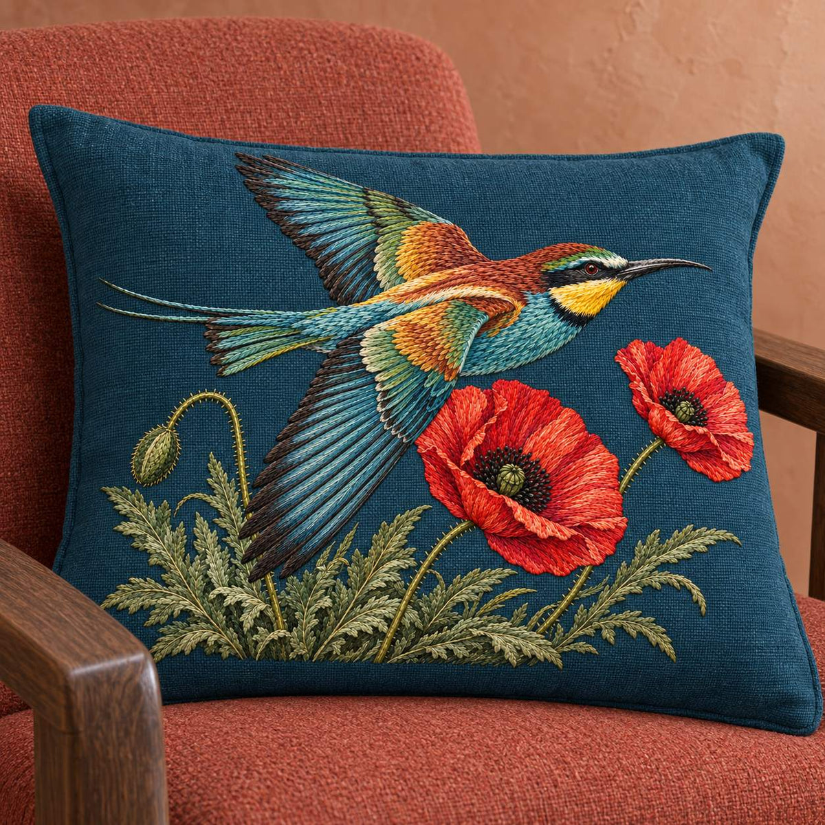 Bee Eater Crossing the Poppy Wind visual mockup shown on a cushion in a lounge chair, with the design on dark teal linen.