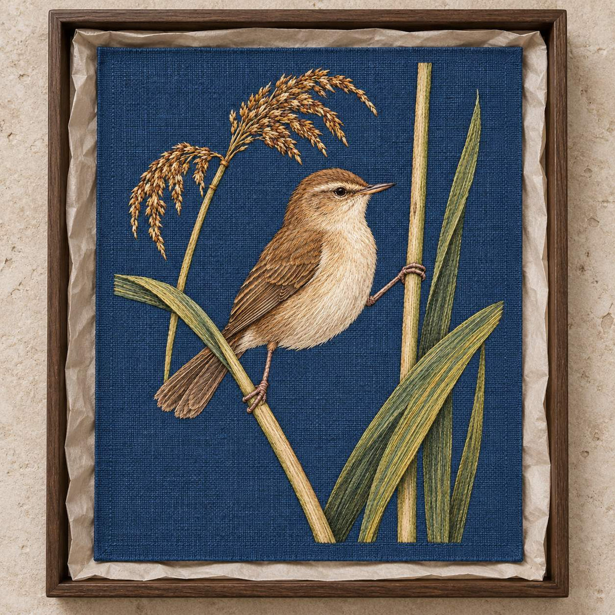 Reed Warbler on the Split Sedge visual mockup shown as a textile panel in a collection tray, with the design on muted blue linen.