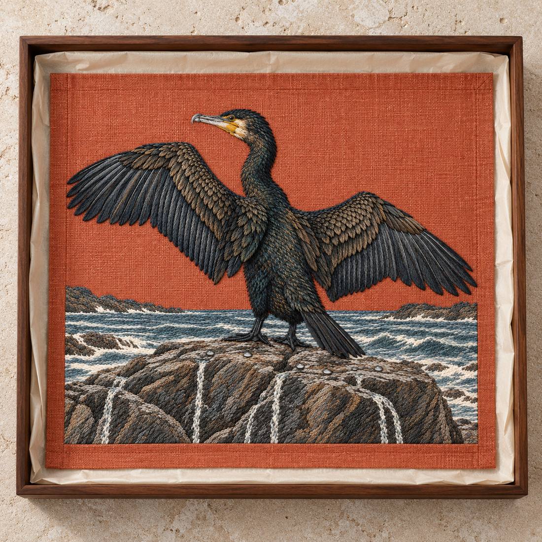 Cormorant Opening the Rain Black Wings visual mockup shown as a textile panel in a collection tray, with the design on muted rust linen.