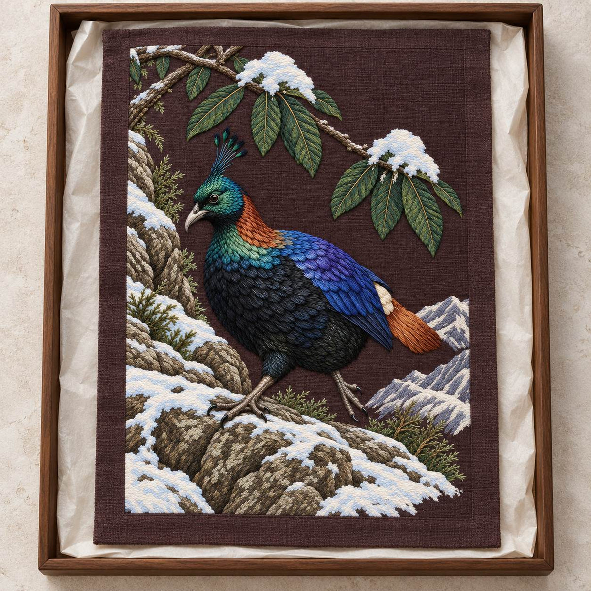 Monal Under the Rhododendron Snow visual mockup shown as a textile panel in a collection tray, with the design on deep plum-brown linen.