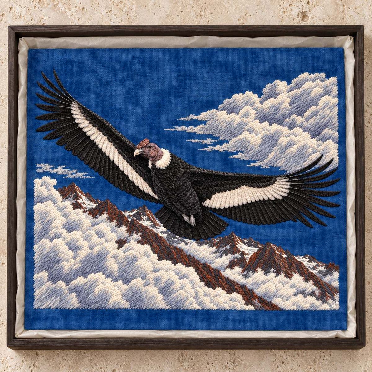 Condor Beyond the High Cloud Gate visual mockup shown as a textile panel in a collection tray, with the design on deep blue linen.