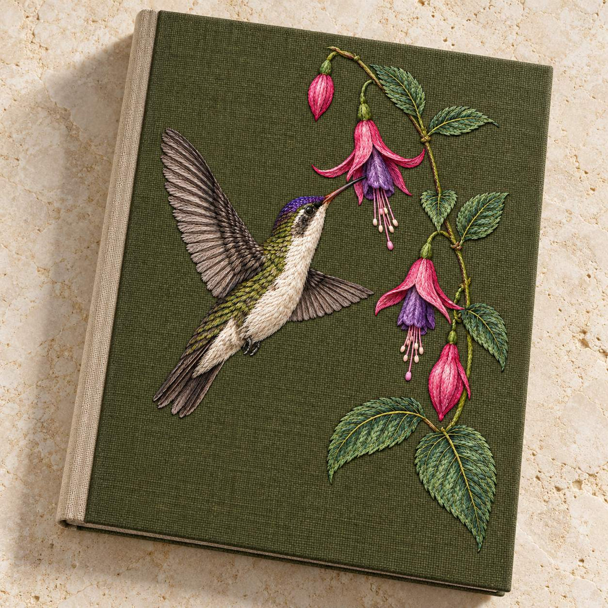 Violet Crown at the Fuchsia Cascade visual mockup shown on a cloth portfolio cover, with the design on dark olive linen.