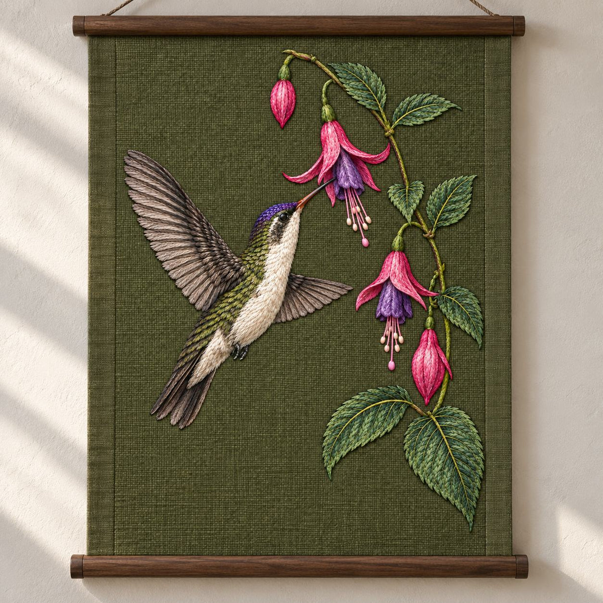 Violet Crown at the Fuchsia Cascade visual mockup shown as a hanging textile held by wooden rails, with the design on dark olive linen.