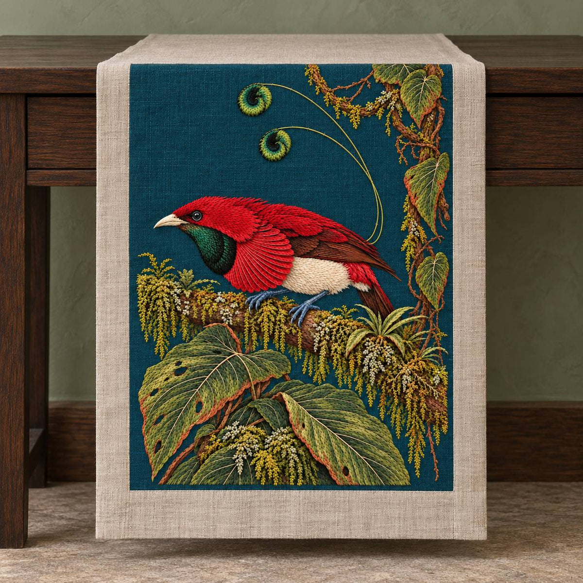Bird of Paradise in the Moss Theatre visual mockup shown on a textile runner over a console, with the design on deep teal linen.