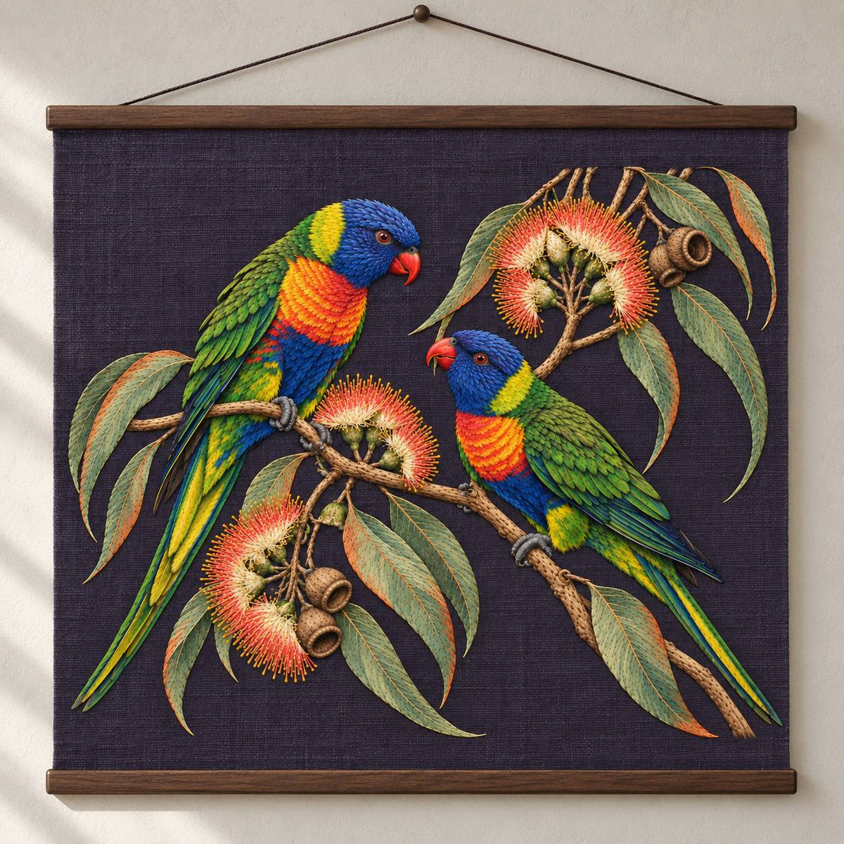 Lorikeet Across the Eucalyptus Fire visual mockup shown as a hanging textile held by wooden rails, with the design on deep violet linen.