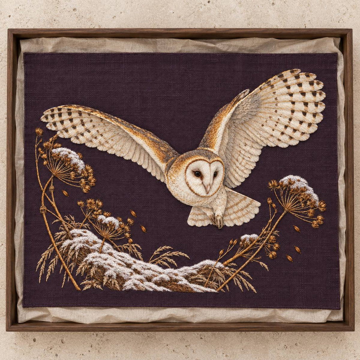Barn Owl Through the Seed Snow Halo visual mockup shown as a textile panel in a collection tray, with the design on deep plum linen.