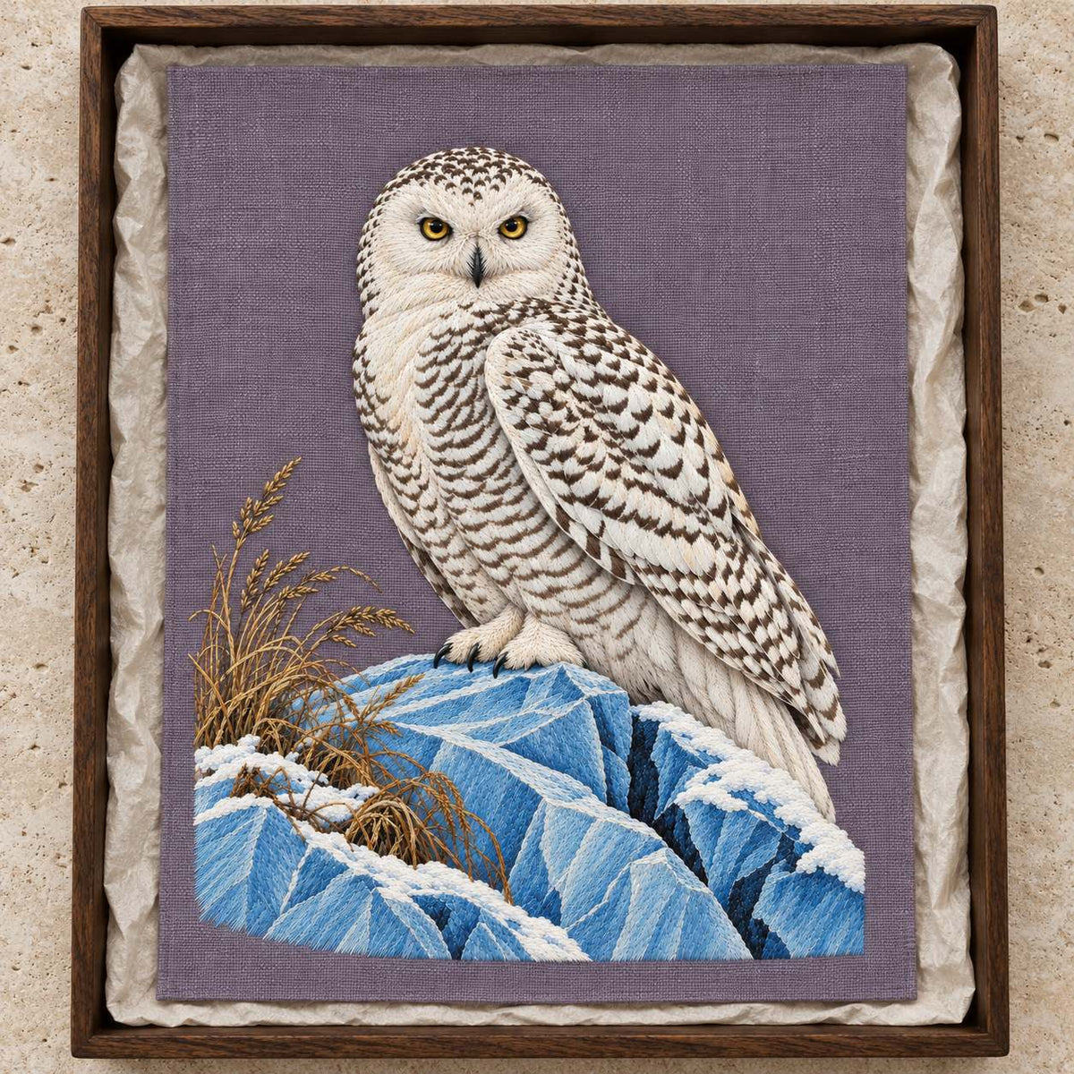 Snowy Owl on the Blue Ice Ridge visual mockup shown as a textile panel in a collection tray, with the design on muted lavender-grey linen.