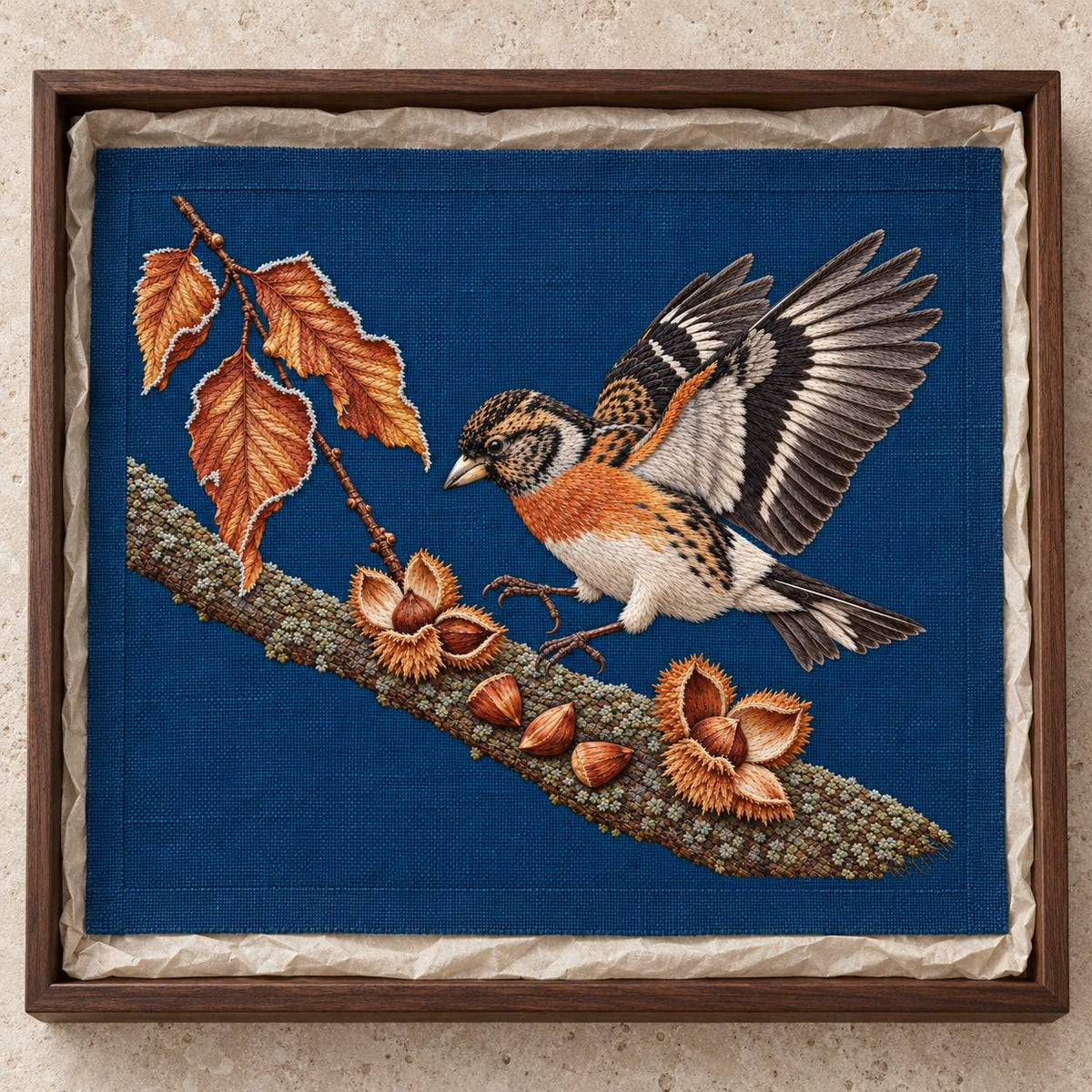 Brambling Above the Frosted Beech Mast visual mockup shown as a textile panel in a collection tray, with the design on deep-blue linen.