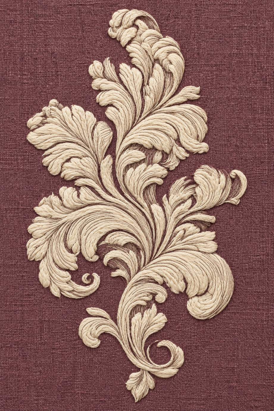 Warm ivory curling acanthus leaf flourish on dusty plum linen.