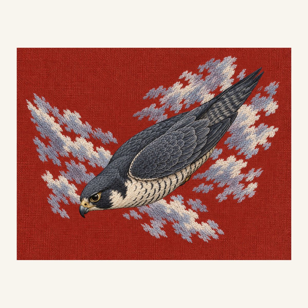 Digital embroidery reference showing a peregrine falcon in folded descent on burnt vermilion linen, landscape composition.