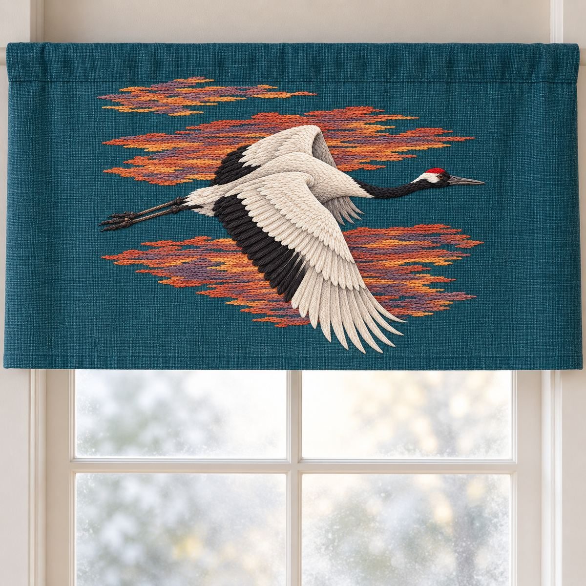 Crane embroidery design in a digital mockup of A blue-green linen large rectangular window valance panel hanging flat above a frosted studio window. Placement inspiration for Study 07.
