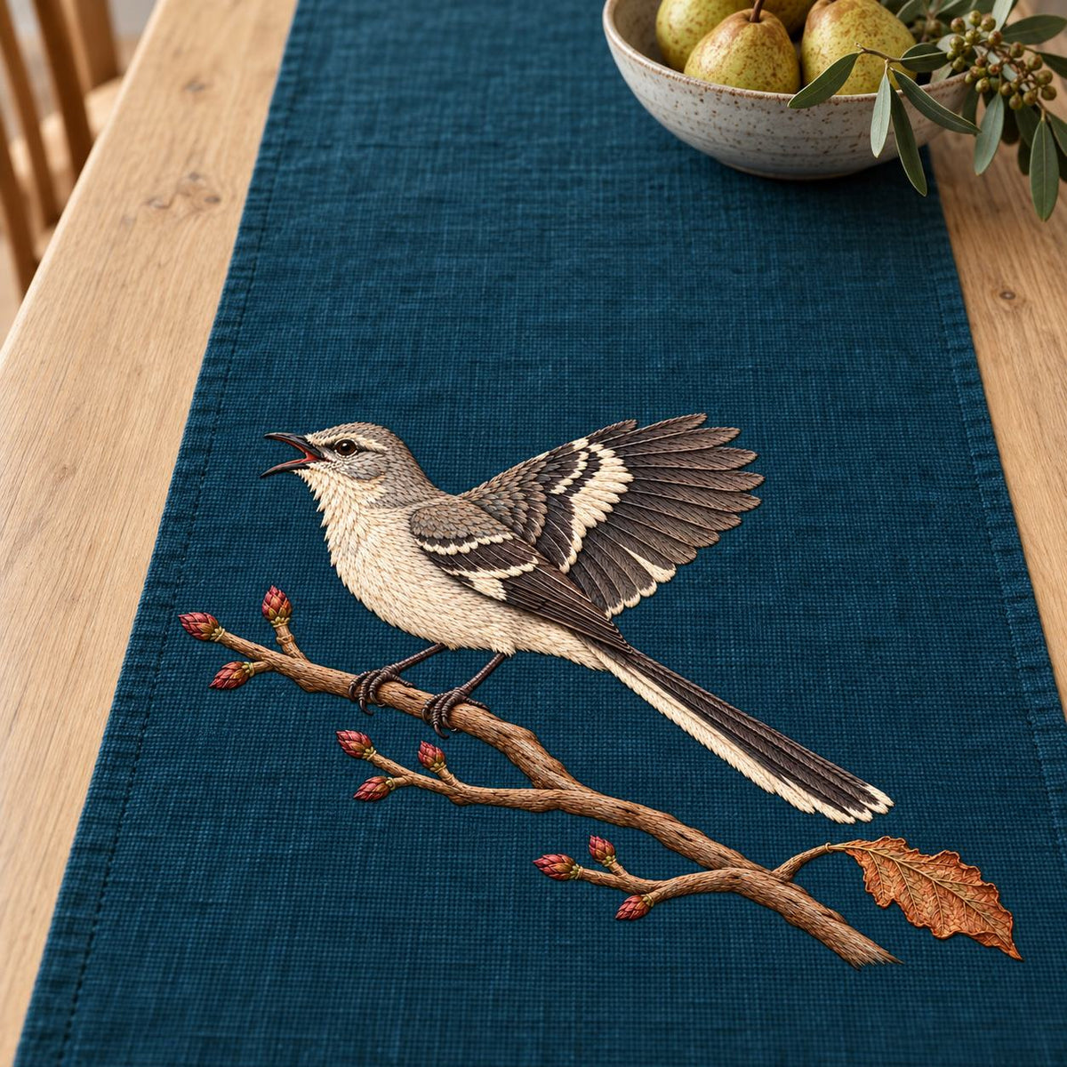 Mockingbird embroidery design in a digital mockup of Table Runner. Placement inspiration for Study 52.