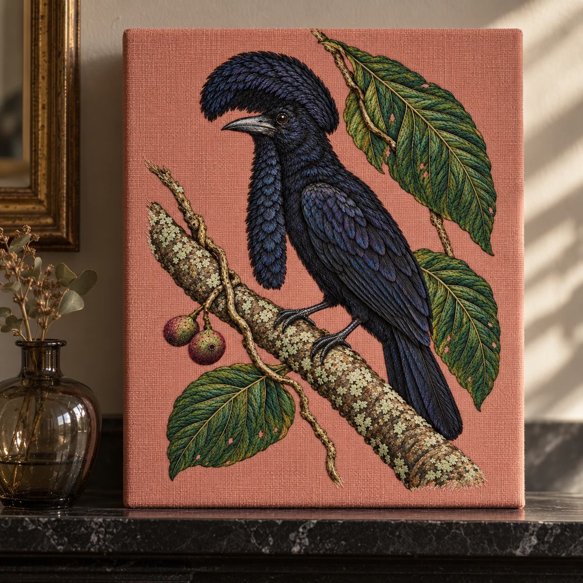 Umbrellabird embroidery design in a digital mockup of A rose textile backed presentation board resting upright on a black stone mantel beside one small smoked-glass vessel, low side daylight. Placement inspiration for Study 76.