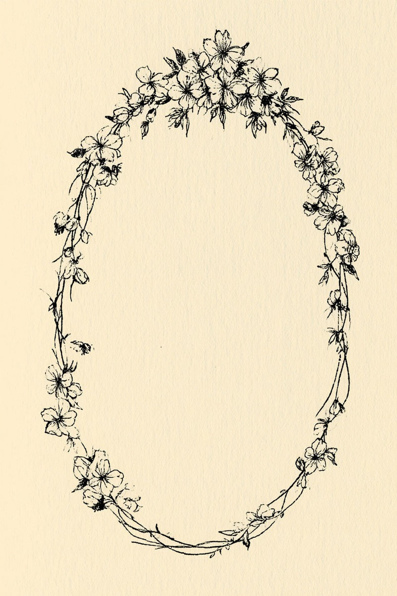 Oval frame drawing surrounded by delicate flowers and leaves.
