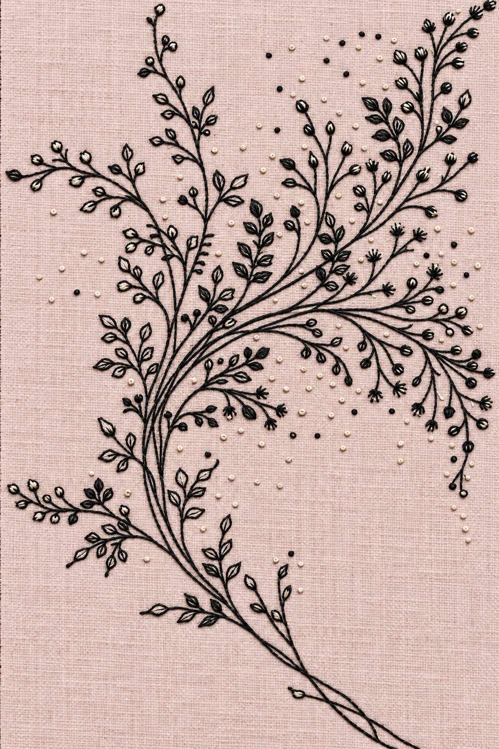 Hand embroidery of one long sweeping curved spray with fine branches, tiny leaves and buds, ending in crossing stems and retaining the original open ground in charcoal-black and ivory cotton on soft pale dusty rose linen.