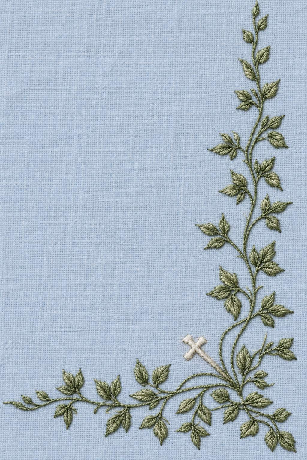 Muted sage leafy corner border with a small warm ivory cross on powder blue linen.