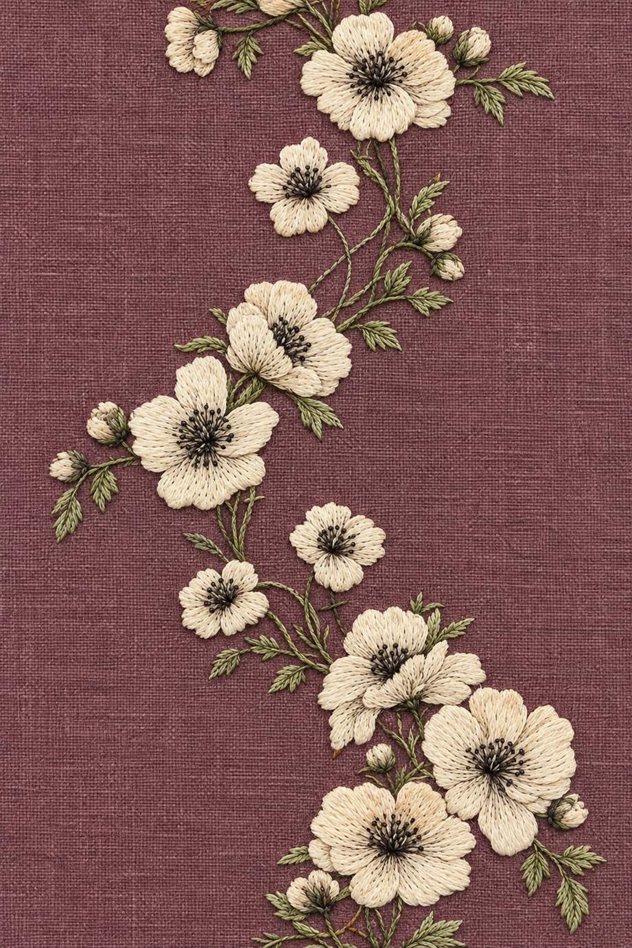 Fine cotton embroidery of winding poppy flower border on dusty plum linen.