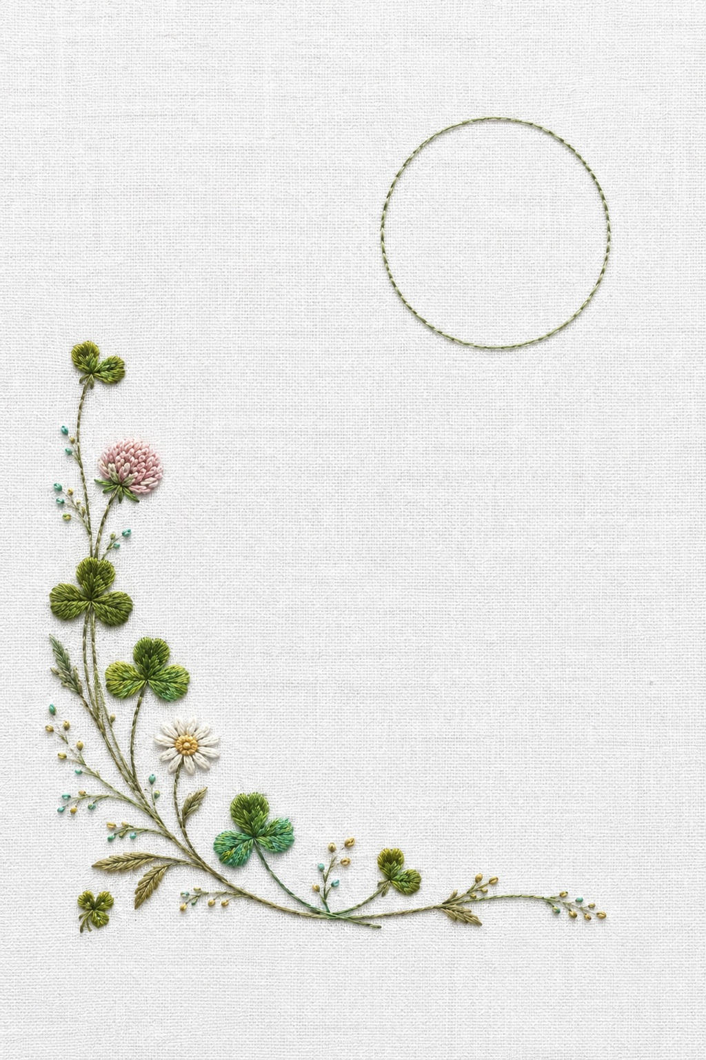 Illustrative embroidery design: Clover grows along an L-shaped lower-left corner, with an unfilled circle in the upper-right field.