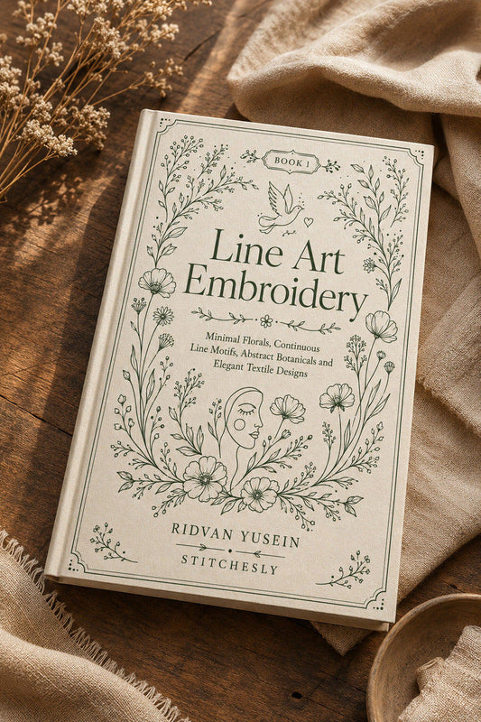 Line Art Embroidery Edition One cover displayed on a natural linen table.