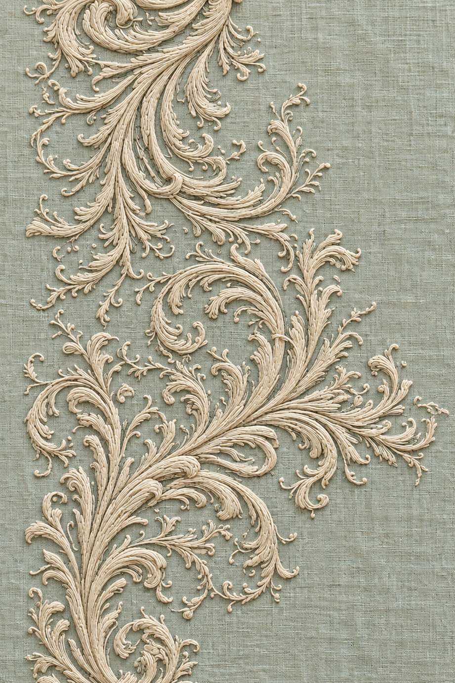 Fine ivory cotton acanthus vine border with intricate scrolls and delicate tendrils on pale celadon linen.