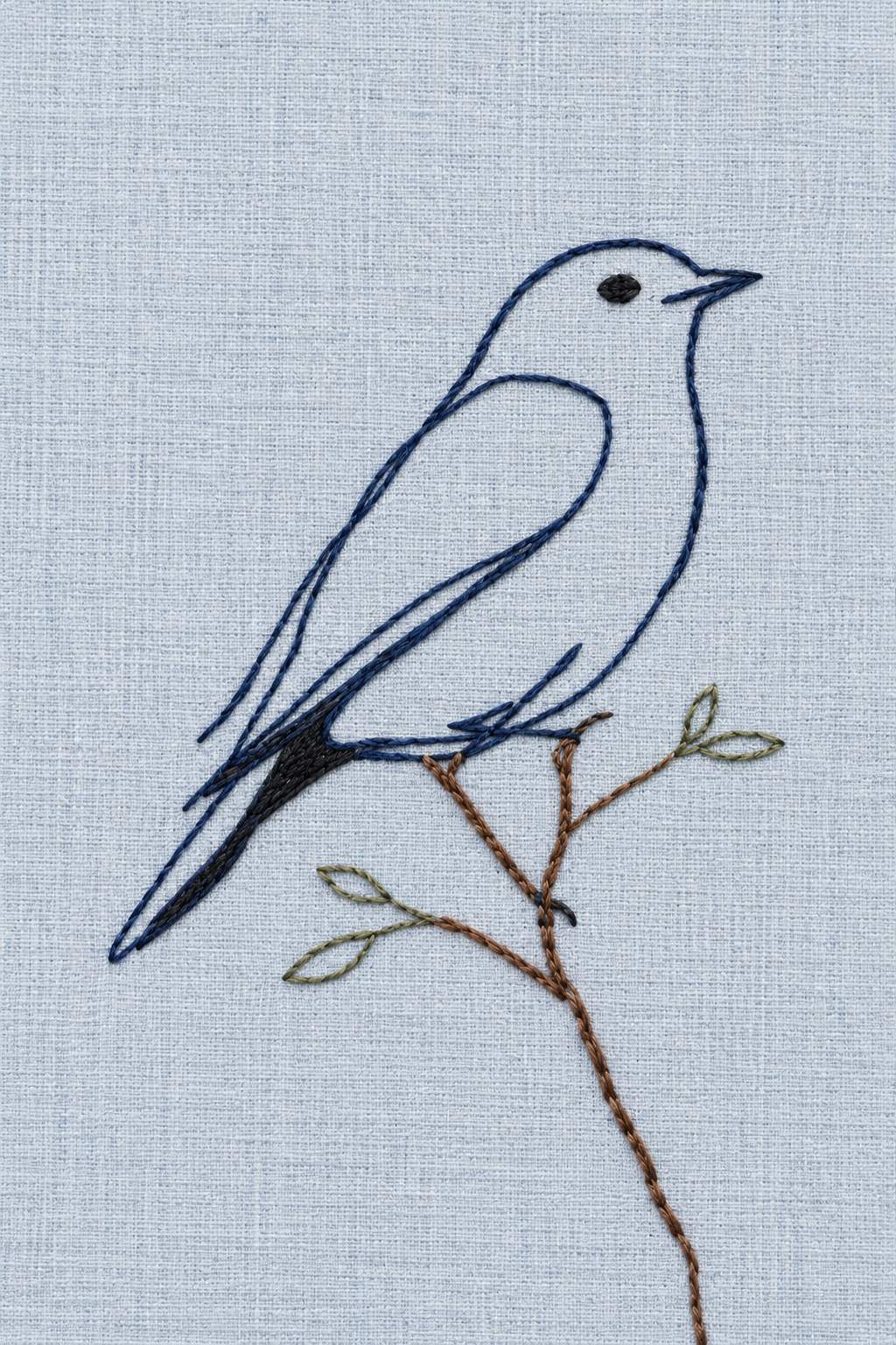 Minimal perched bird outline, rendered as fine cotton hand embroidery. Scandinavian, Sashiko and Northern Minimal Stitch, Book 4.