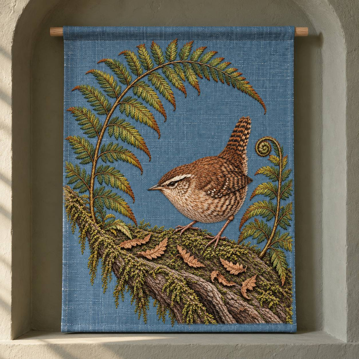 Wren Inside the Fern Gate visual mockup shown as a hanging textile held by wooden rails, with the design on muted slate-blue linen.